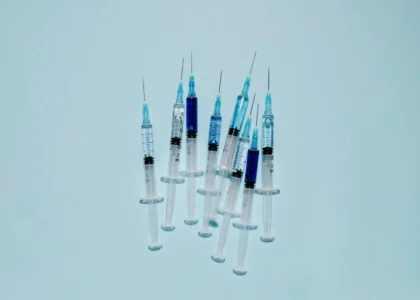 Syringes with needles, representing advanced wound care treatments and regenerative healing solutions for chronic wounds.